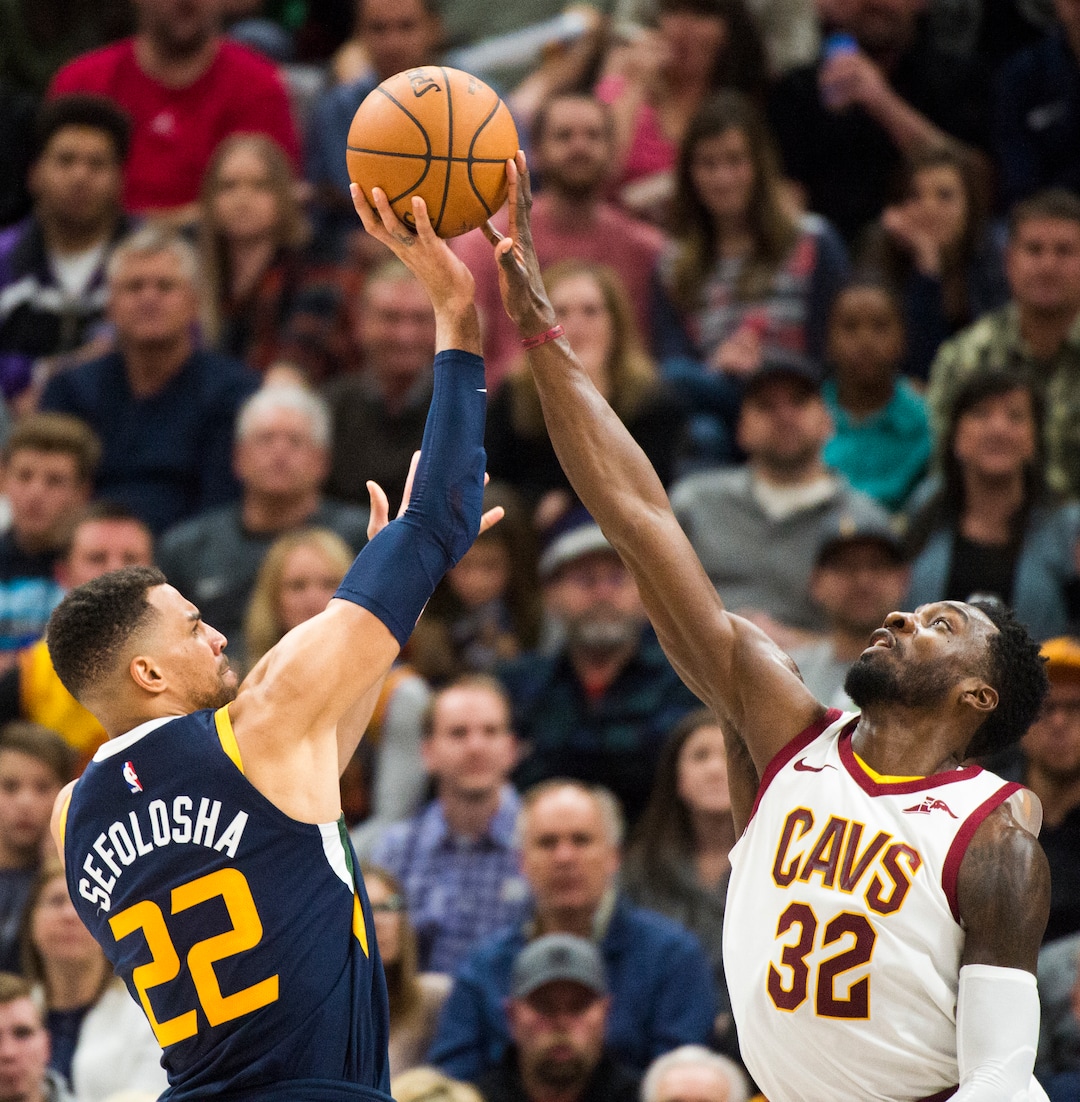 (Rick Egan  |  The Salt Lake Tribune)   Utah Utah Jazz forward Thabo Sefolosha (22) takes a shot as Cleveland Cavaliers forward Jeff Green (32) defends, in NBA action Utah Jazz vs Cleveland Cavaliers, in Salt Lake City,  Saturday, December 30, 2017.