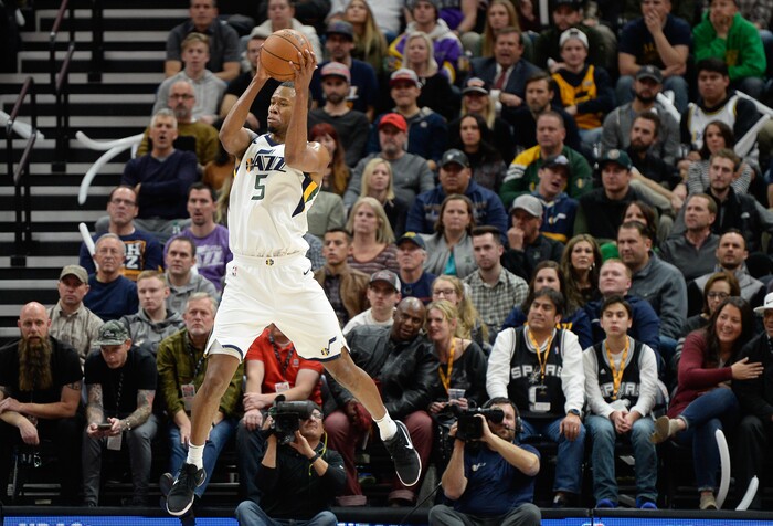 (Francisco Kjolseth  |  The Salt Lake Tribune)  Utah Jazz guard Rodney Hood (5) snags a rebounder from the Spurs during the first half of the NBA basketball game in Salt Lake City, Thursday, Dec. 21, 2017.