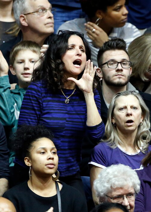 Actress Julia Louis-Dreyfus reacts to a call as she watches an NCAA college basketball game between Northwestern and Michigan during the second half Wednesday, March 1, 2017, in Evanston, Ill. Northwestern won 67-65. Julia Louis-Dreyfus' son Charlie Hall plays at Northwestern basketball team. (AP Photo/Nam Y. Huh)