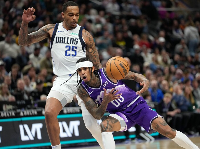 (Francisco Kjolseth  |  The Salt Lake Tribune) Dallas Mavericks forward P.J. Washington (25) pressures Utah Jazz guard Jordan Clarkson (00) during an NBA basketball game Monday, March 25, 2024, in Salt Lake City.