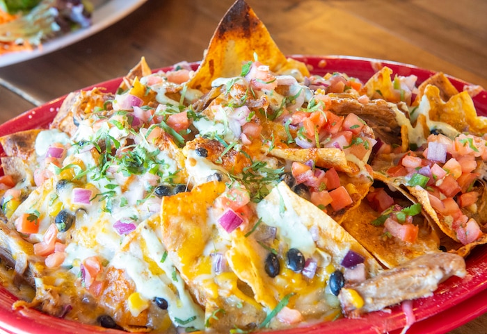 (Rick Egan  |  The Salt Lake Tribune)     ChHar-Tipped Roasted Park Chili Verde Nachos, at Slackwater Pizzeria in Sandy, Thursday, March 5, 2020.