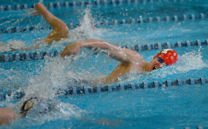 (Francisco Kjolseth  |  The Salt Lake Tribune)  Ryan Bunn of Hurricane pushes ahead to a first place finish in the Men 200 Yard Free at the high school swimming 4A State Championships in Bountiful, Friday February 9, 2018.