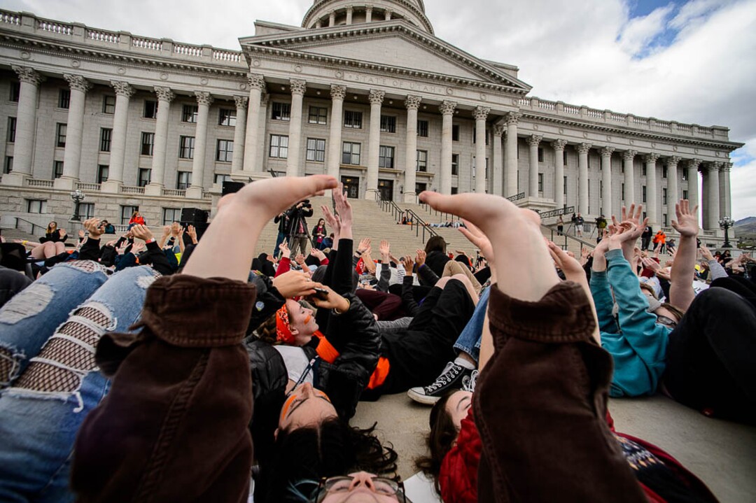 (Trent Nelson | The Salt Lake Tribune)  High school students staged a die-in at the Utah State Capitol in Salt Lake City to mark the anniversary of the Columbine High School massacre and call for action against gun violence, Friday April 20, 2018.