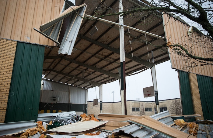 (Nick Wagner | Austin American-Statesman via AP) The Rockport-Fulton high school gymnasium walls expose the interior after Hurricane Harvey ripped through Rockport, Texas, on Saturday, Aug. 26, 2017.  The fiercest hurricane to hit the U.S. in more than a decade spun across hundreds of miles of coastline where communities had prepared for life-threatening storm surges, walls of water rushing inland.