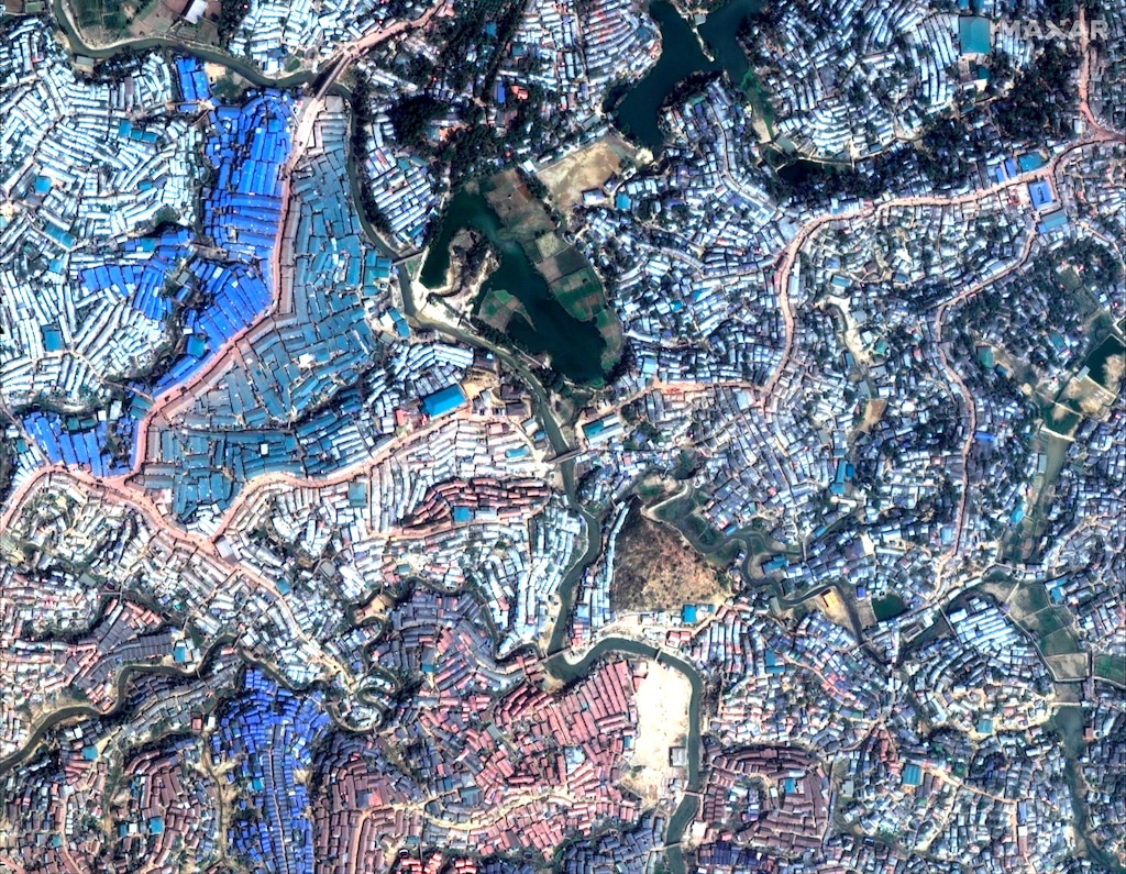 (Satellite image ©2019 Maxar Technologies via AP) This Dec. 12, 2018 image provided by Maxar Technologies shows temporary shelters that have been erected in the Kutupalong area of Cox's Bazar, Bangladesh.