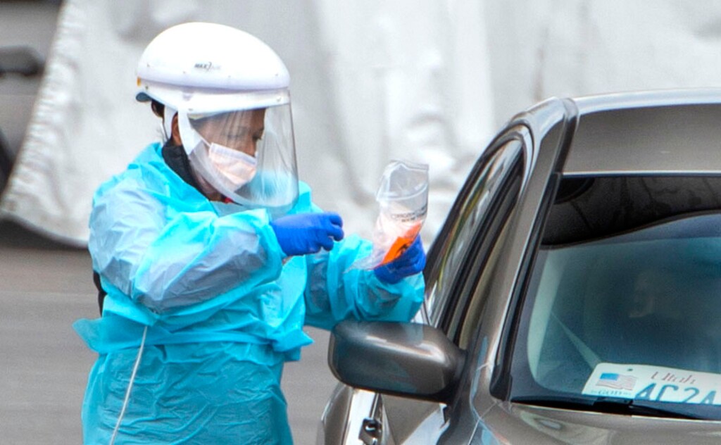 (Rick Egan | The Salt Lake Tribune). Motorists get tested for Covid-19 at the Redwood Testing Center in Salt Lake City, on Friday, Nov. 6, 2020.