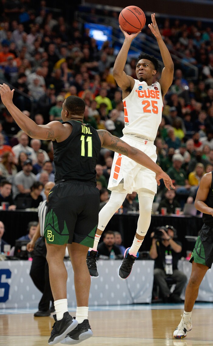 (Francisco Kjolseth  |  The Salt Lake Tribune)  Syracuse Orange guard Tyus Battle (25) puts in a three pointer as Syracuse faces Baylor in their first round menÕs NCAA March Madness tournament game at Vivint Smart Home Arena in Salt Lake City on Thursday, March 21, 2019.