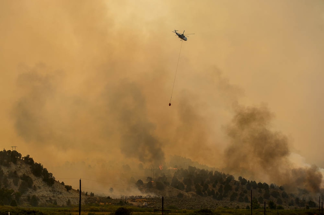 (Trent Nelson | The Salt Lake Tribune) The Coal Hollow Fire burns along Highway 6 in Utah County, Thursday Aug. 9, 2018.