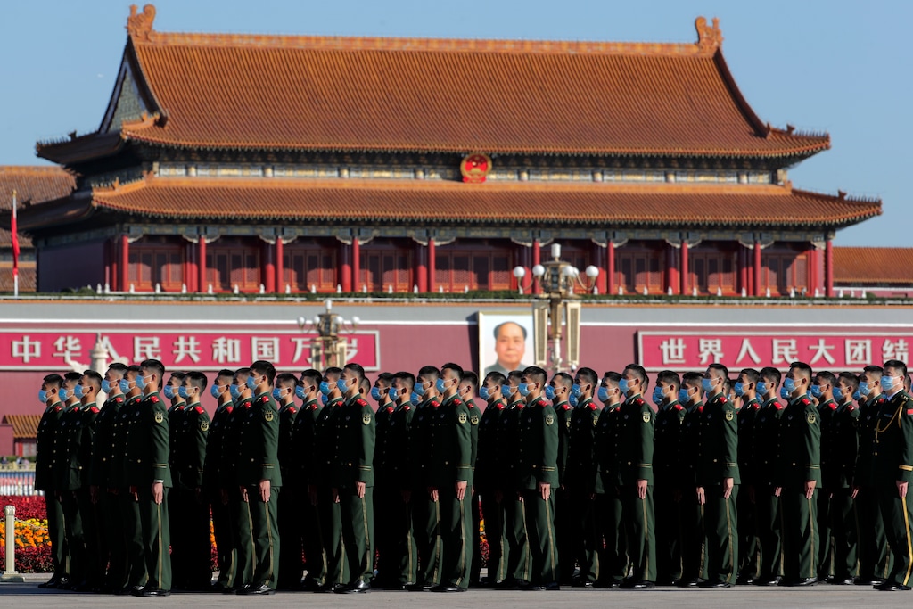(Andy Wong | AP) Chinese paramilitary police in Beijing's Tiananmen Square in 2020. Local governmental authorities recently banned Latter-day Saint congregations in Beijing and elsewhere in China.