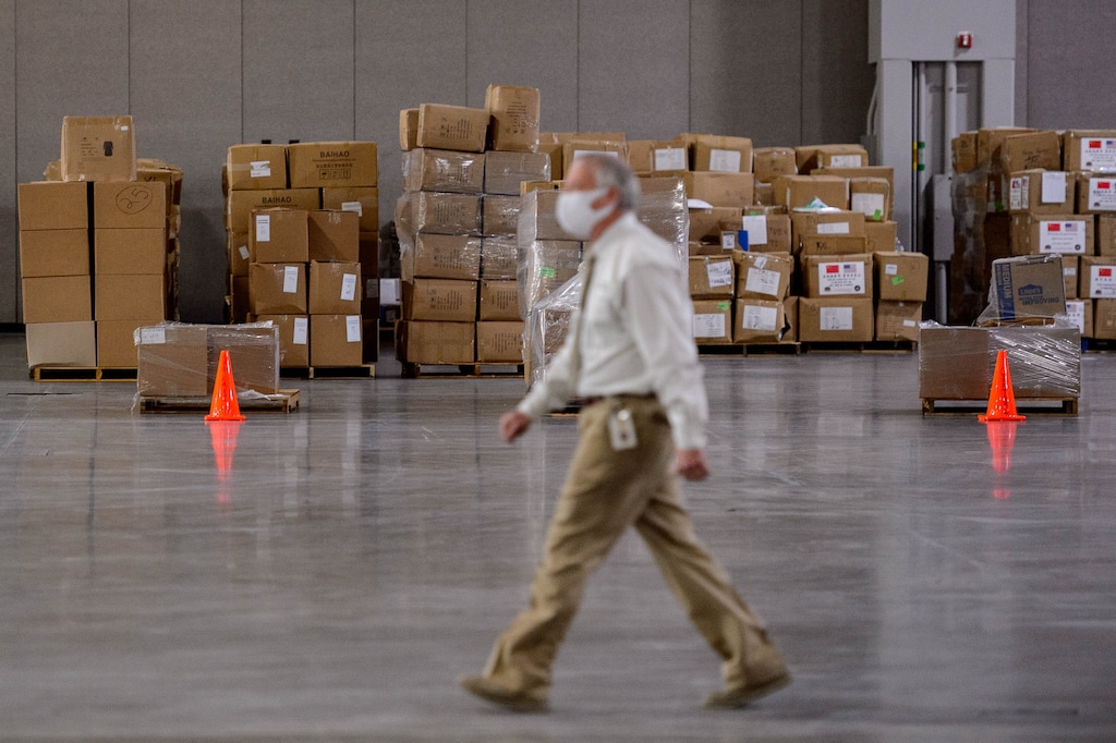 (Trent Nelson | Tribune file photo) Workers organize supplies at the Receiving, Staging and Shipping Center at the Salt Palace Convention Center in Salt Lake City on Friday, May 8, 2020. The center serves as a central location for personal protective equipment received by the State of Utah and sent to hospitals, local health departments and emergency managers.