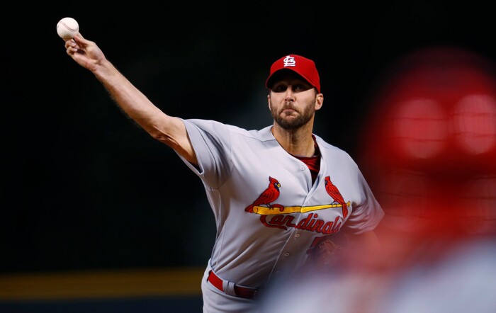 St. Louis Cardinals starting pitcher Adam Wainwright delivers a pitch to Colorado Rockies' Charlie Blackmon in the first inning of a baseball game Tuesday, Sept. 20, 2016 in Denver. (AP Photo/David Zalubowski)
