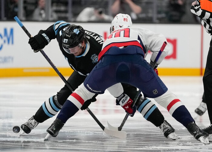 (Francisco Kjolseth | The Salt Lake Tribune) Utah Hockey Club center Barrett Hayton (27) squares off with Washington Capitals left wing Pierre-Luc Dubois (80) during an NHL hockey game at the Delta Center in Salt Lake City on Monday, Nov. 18, 2024.