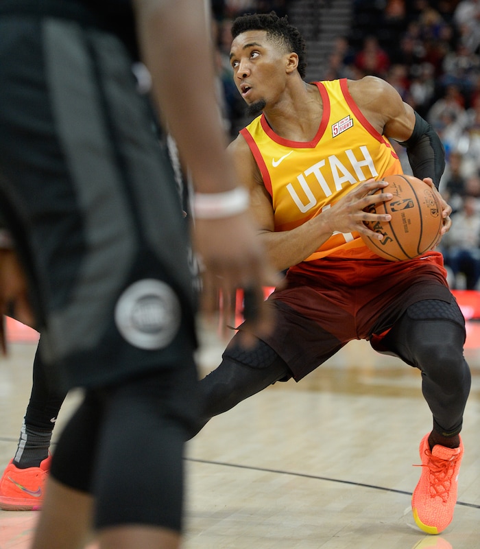 (Francisco Kjolseth  |  The Salt Lake Tribune)  Utah Jazz guard Donovan Mitchell (45) tries to get past the Pistons in the first half of their NBA game at Vivint Smart Home Arena Monday, Jan. 14, 2019, in Salt Lake City.