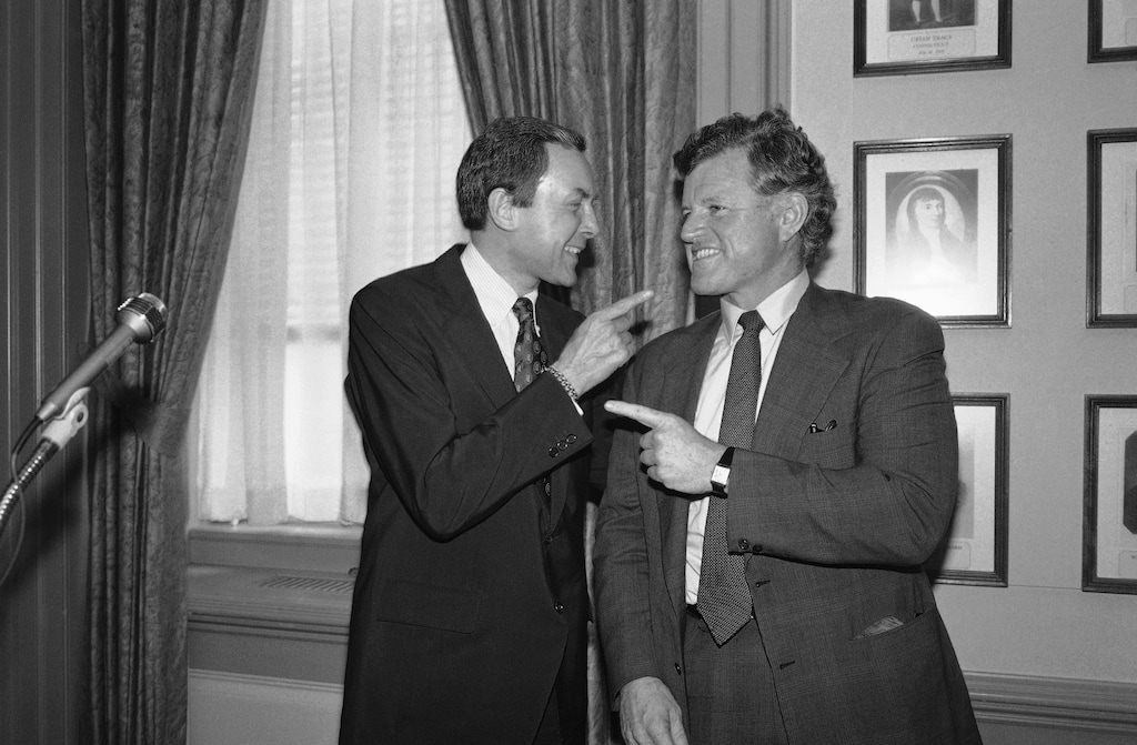 (John Duricka | AP file photo) In this June 11, 1981, photo, Sen. Orrin Hatch, R-Utah, left, and Sen. Edward M. Kennedy, D-Mass., do some finger-pointing before a press conference at the Capitol by members of the Senate Labor and Human Resources Committee in Washington.