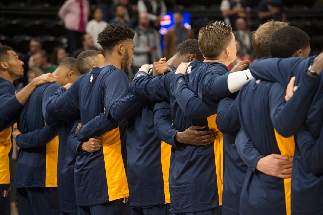 (Rick Egan  |  The Salt Lake Tribune) The Utah Jazz stand together arm in arm, during the national anthem, in preseason basketball  action, Utah Jazz vs. Sydney Kings, in Salt Lake City, Sunday, October 2, 2017.