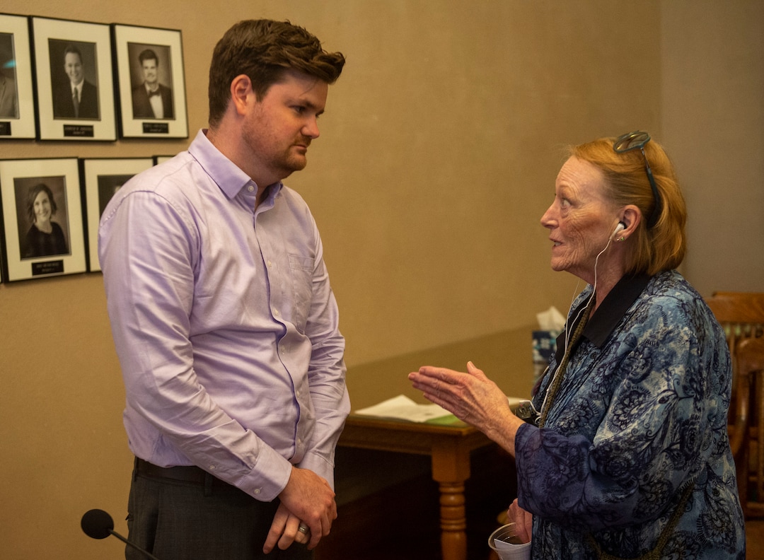 Salt Lake City Council member Chris Wharton visits with Jill Merritt after the City Council to vote yes on a proposal that would grant up to $28 million in tax increment reimbursement to a developer seeking to build a 3,000 acre industrial development in the city’s northwest side, during a Salt Lake City Council redevelopment agency meeting. Tuesday, Aug. 27, 2019.