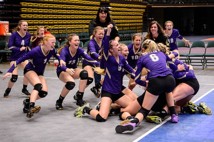 (Trent Nelson | The Salt Lake Tribune) North Summit players celebrate after defeating Enterprise in the 2A State Volleyball Championship game in Orem, Saturday October 28, 2017.