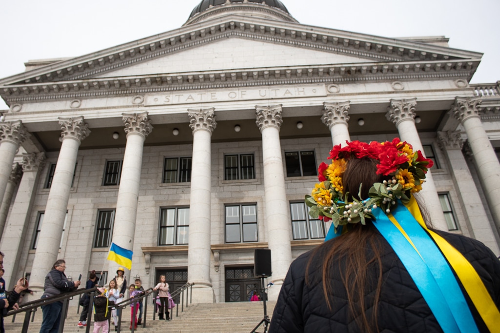(Jordan Miller | The Salt Lake Tribune) Maria Volkanova wears a Ukrainian wreath in front of the Utah Capitol  "365 Days of Defending Freedom" rally on Saturday, Feb. 25, 2023.