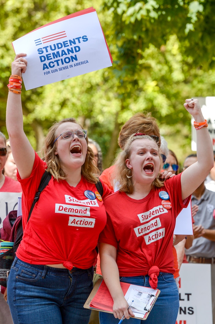 (Leah Hogsten  |  The Salt Lake Tribune) l-r After her sister was at Columbine High School shooting in 1999, Bailey Golding, 19, and her friend Molly Perez started a student group in Utah and Salt Lake counties Members of Moms Demand Action for Gun Sense in America gathered at Washington Square Park to demand change in gun laws in reaction to the August mass shootings in Dayton, Ohio and El Paso, Texas, and the hundreds of Americans who are wounded and killed by gun violence every day.