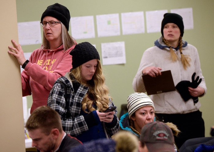 (Al Hartmann | The Salt Lake Tribune) Dozens of volunteers dressed for the cold wait to get their assignments at 3:45 a.m Thursday, Jan. 25, 2018, for the annual Point In Time count of homeless people in Salt Lake City.