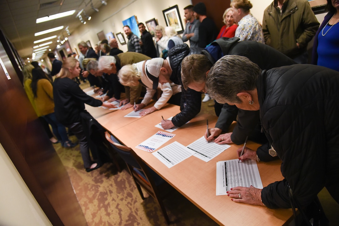(Francisco Kjolseth  |  The Salt Lake Tribune)  People sign in as U.S. Senator Mitt Romney gets ready to hold a town hall meeting at the Davis County administration building, Tuesday, January 22, 2019, to hear from local residents.