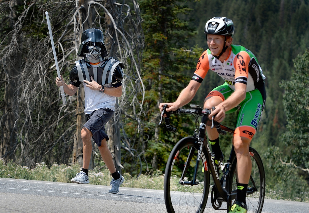 (Scott Sommerdorf   |  The Salt Lake Tribune)   Race fan Eric Sevy of Las Vegas ran alongside riders telling them to Use the force! as they ascended the time trial course at the Tour of Utah stage 3 in Big Cottonwood Canyon, Wednesday, August 2, 2017.