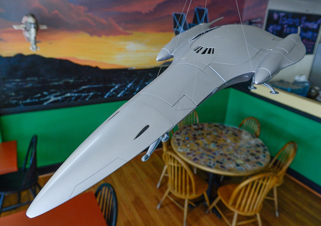 (Francisco Kjolseth  |  The Salt Lake Tribune)  A space vehicle and a futuristic mural of the Salt Lake City skyline — with two suns — are part of the "Star Wars" decor at The Twin Suns Cafe in Sugar House.