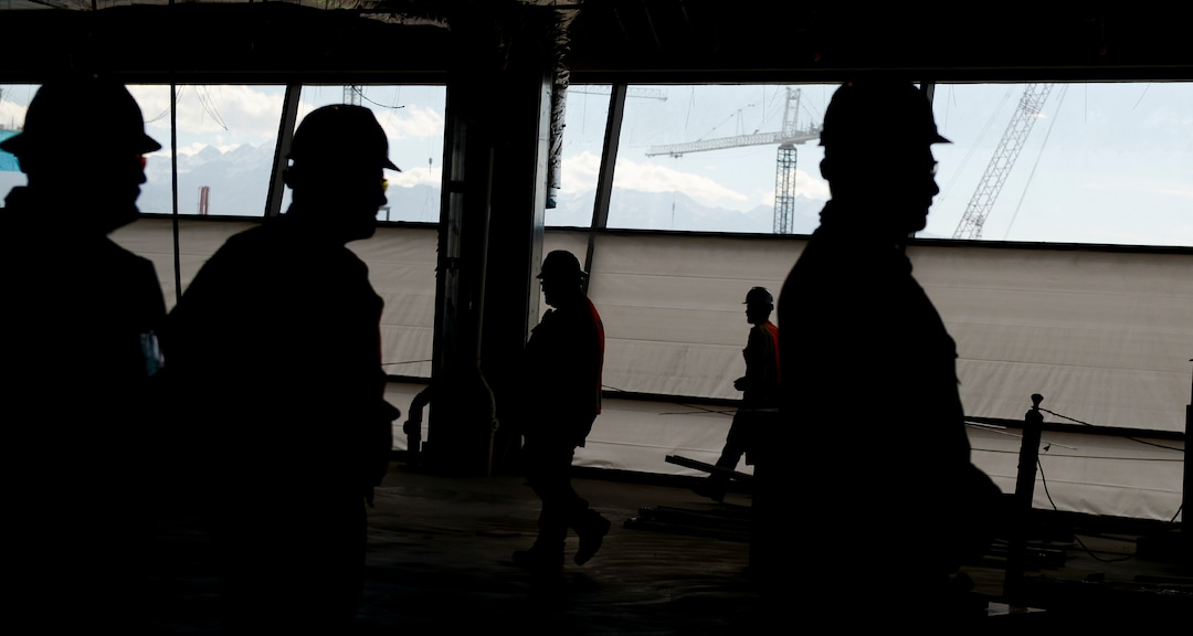 Leah Hogsten  |  The Salt Lake Tribune Salt Lake City International Airport redevelopment project managers lead members of the media on a tour of the airport expansion construction site, Monday, Oct. 22, 2018. The first phase construction of the $3.6 billion project is due to open in 700 days. Nearing completion is the new concourse for aircraft gates, an enclosed terminal, the steel skeleton of a new "gateway" building, a five-story parking garage and elevated roadways. 