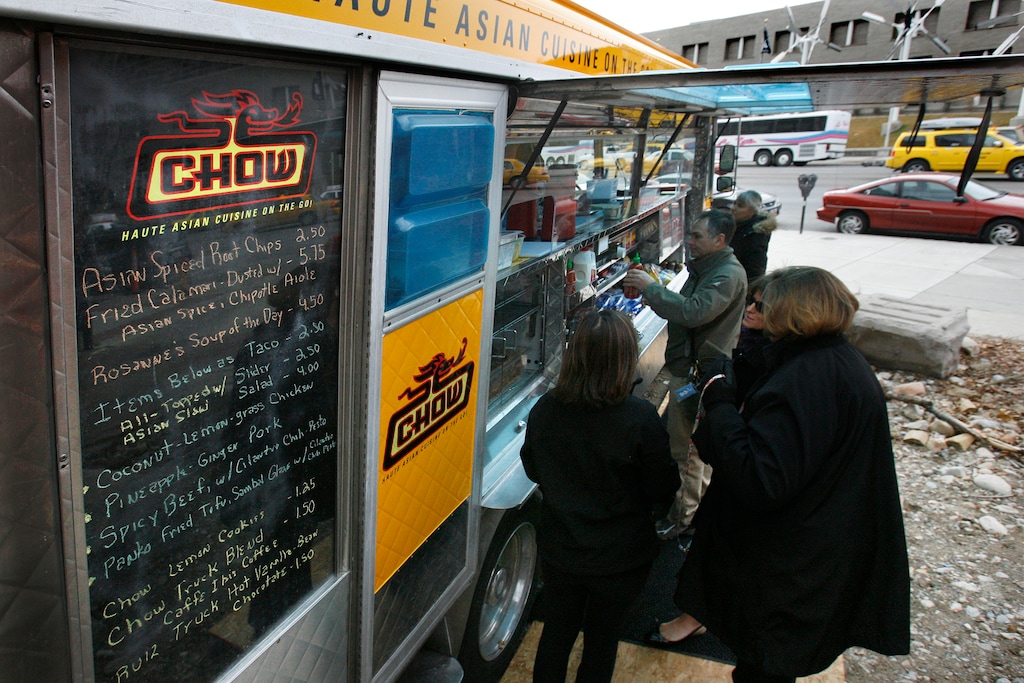 (Scott Sommerdorf  |  Salt Lake Tribune)  Customers line up to order from the menu at The Chow Truck, one of several popular restaurants and eateries that closed in 2018.