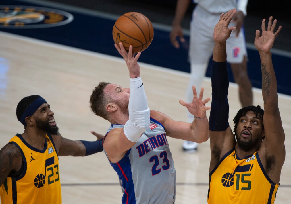 (Rick Egan | The Salt Lake Tribune) Detroit Pistons forward Blake Griffin (23) shoots as Utah Jazz center Derrick Favors (15) defends, in NBA action between the Utah Jazz and the Detroit Pistons at Vivint Arena, on Tuesday, Feb. 2, 2021.