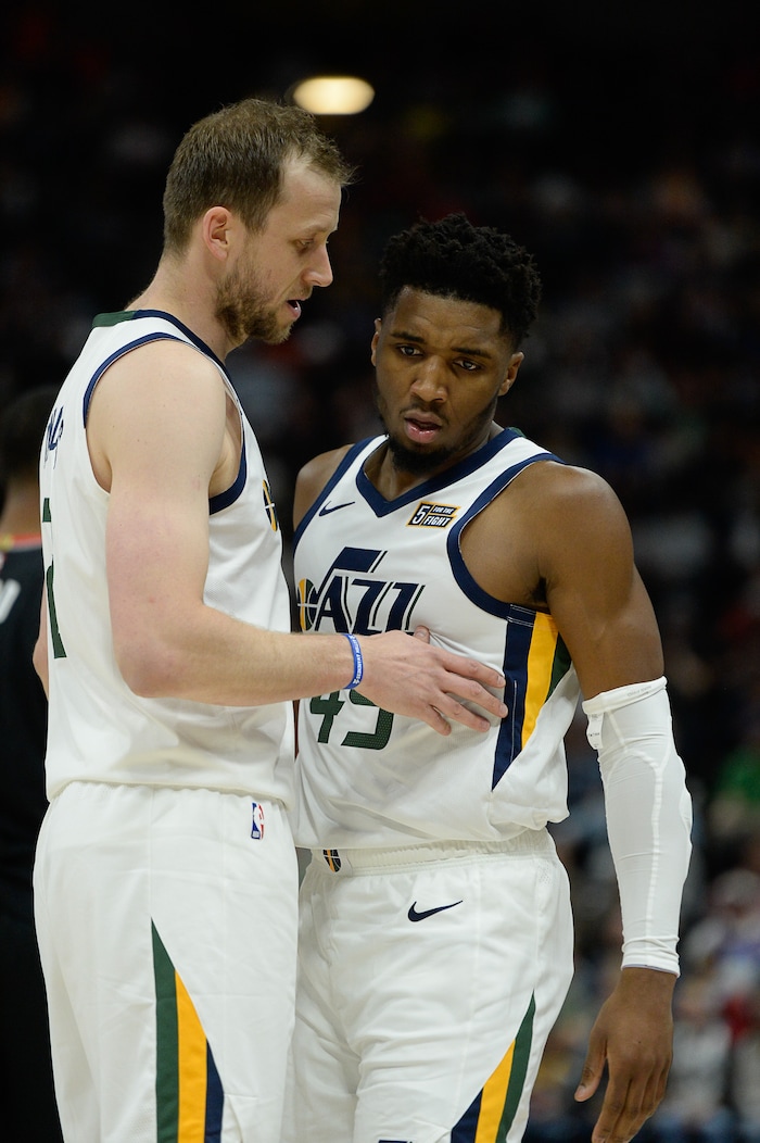 (Francisco Kjolseth  |  The Salt Lake Tribune)  Utah Jazz forward Joe Ingles (2) speaks with Utah Jazz guard Donovan Mitchell (45) as the Utah Jazz host the Portland Trailblazers in their NBA basketball game at Vivint Smart Home Arena in Salt Lake City on Wed. Oct. 16, 2019.