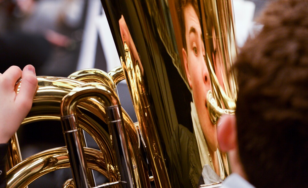Leah Hogsten  |  The Salt Lake Tribune   Tuba player Preston Palmer takes a deep breath before hitting his notes Thursday at practice. Utah Symphony Music Director Thierry Fischer is helping members of the Cottonwood High School symphony bring to life Stravinsky's "The Firebirdâ" through the first Adopt a School pilot program. They will culminate in the performance of the piece on May 20, with Maestro Fischer conducting the live streamed event to other participating Utah orchestras who will be following along as the state's largest "Super Orchestra."