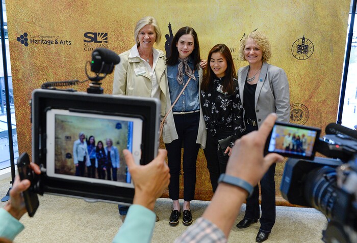 (Francisco Kjolseth  |  The Salt Lake Tribune)  Students Camille Whisenant, 18, center left, and Gracie Kilminster, 17, both seniors at Highland High get a chance to see Hamilton with Mayor Jackie Biskupski, at right, who was joined by her wife Betty on Thursday, April 19, 2018, at the Eccles Theater. As part of the New Nation Project, kids were challenged to write to politicians for the chance to win tickets and attend with a legislator or political leader of their choice as a way to educate them on a topics the teens care about and offer solutions. 