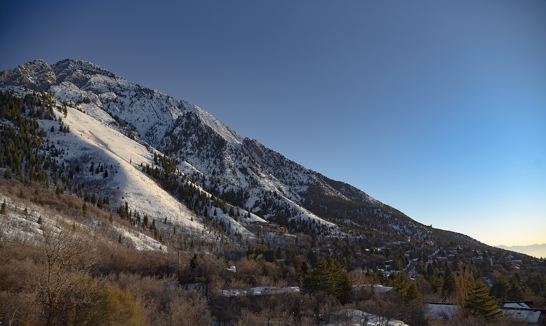 (Francisco Kjolseth  |  The Salt Lake Tribune) The sun sets on Mount. Olympus in Salt Lake City County as a proposed alignment for the Bonneville Shoreline Trail crosses designated wilderness in several spots along the Wasatch foothills. A forthcoming bill from Rep. John Curtis, R-Utah, would adjust wilderness boundaries so that the trail could accommodate mountain bikes, which are not allowed in wilderness areas.