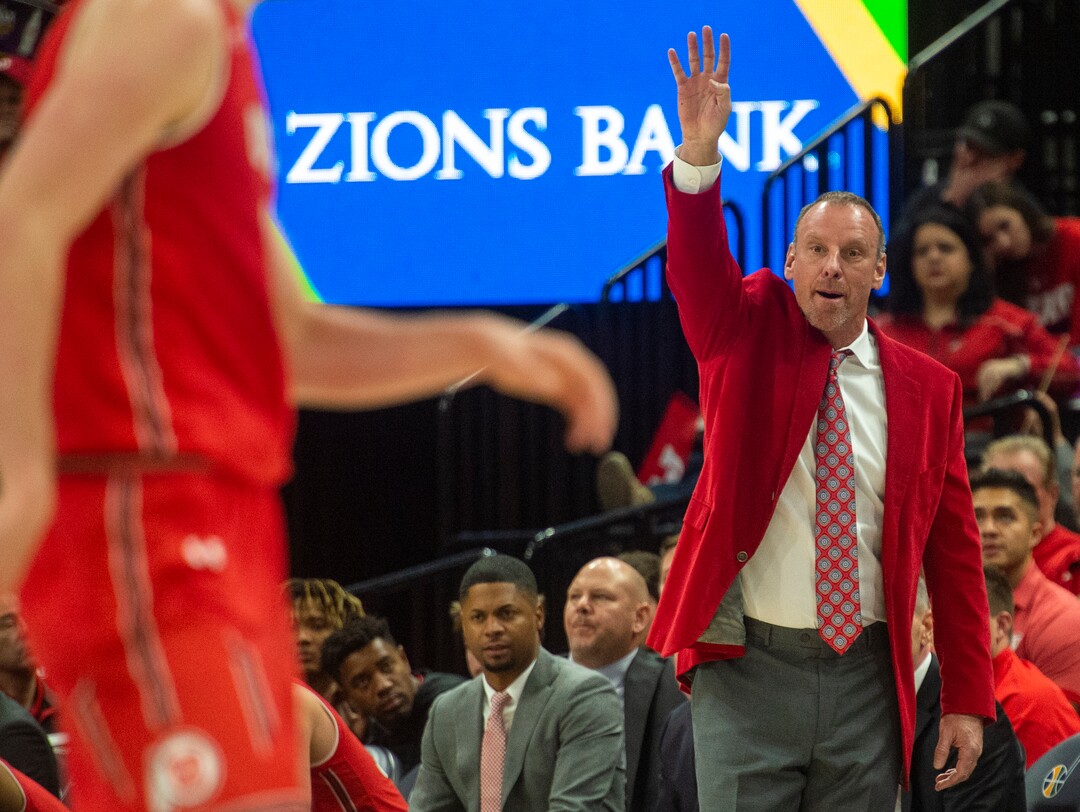 (Rick Egan  |  The Salt Lake Tribune)   Utah Utes head coach Larry Krystkowiak shouts to his team, in basketball action in the Beehive Classic, between against the Brigham Young Cougars and Utah Utes, at the Vivint Smart Home Arena, Saturday December 8, 2018.