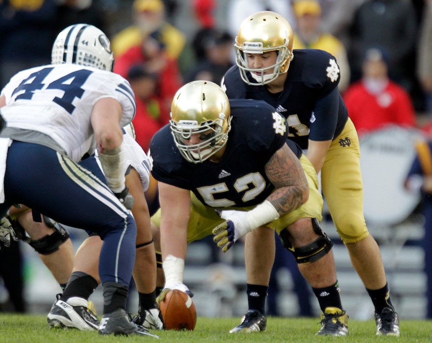 (Michael Conroy, AP Photo) Notre Dame center Braxston Cave snaps the ball to Notre Dame quarterback Tommy Rees during the second half of an NCAA college football game against the BYU in South Bend, Ind., Saturday, Oct. 20, 2012. Notre Dame defeated BYU 17-14.