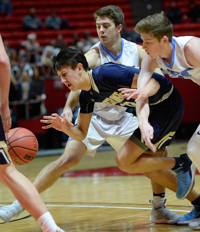 (Francisco Kjolseth  |  The Salt Lake Tribune)  Westlake vs Layton, 6A State high school basketball tournament at the Huntsman Center in Salt Lake City, Thursday March 1, 2018. Kekoa Baker (12), tries to push past Layton.  