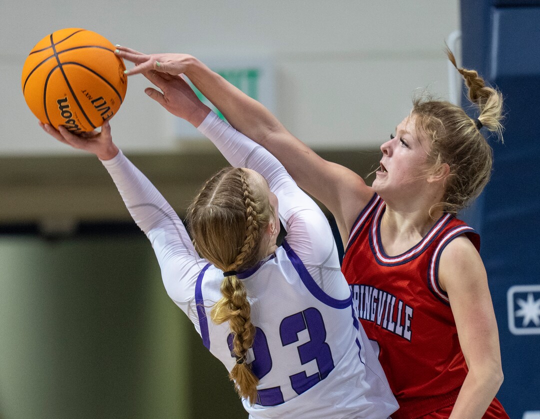 (Rick Egan | The Salt Lake Tribune) Lehi guard, Addy Scrivner (23)Shoots, as Springville Red Devils guard, Ellie Esplin (1) defends, in the girls 5A State Championship game between the Springville Red Devils and the Lehi Pioneers, at the Marriott Center in Provo, on Saturday, March 5, 2022. 