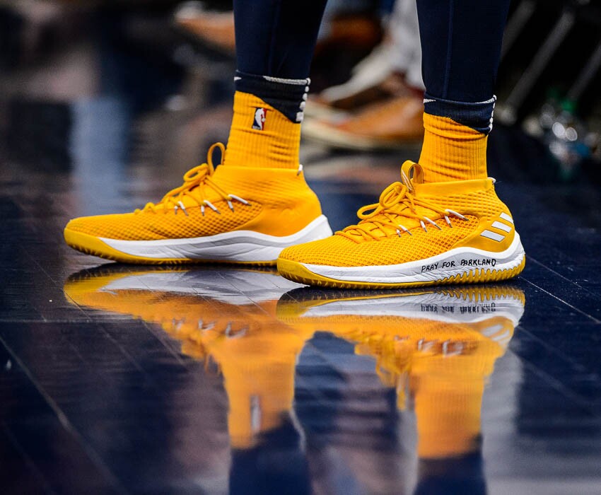 (Trent Nelson | The Salt Lake Tribune) Utah Jazz guard Donovan Mitchell's shoes read "Pray for Parkland," refering to a shooting today at a Florida high school, as the Utah Jazz host the Phoenix Suns, NBA basketball in Salt Lake City, Wednesday Feb. 14, 2018.