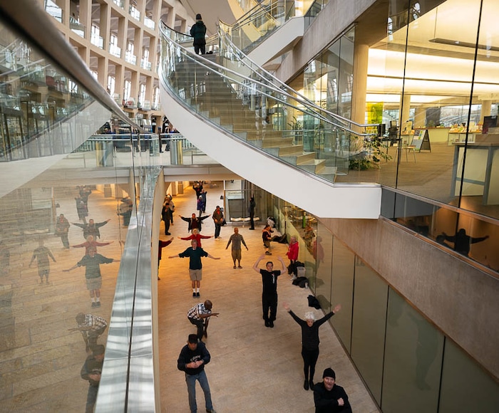 (Trent Nelson | The Salt Lake Tribune)  
A group of homeless people practice tai chi at the Main Library in Salt Lake City on Wednesday April 3, 2019.