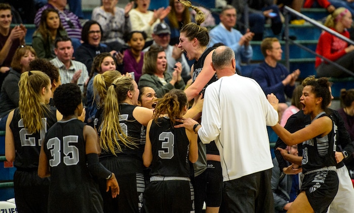 (Steve Griffin  |  The Salt Lake Tribune)  Riverton celebrates their victory over  Copper Hills at Cooper Hill s High School in West Jordan Thursday February 1, 2018.