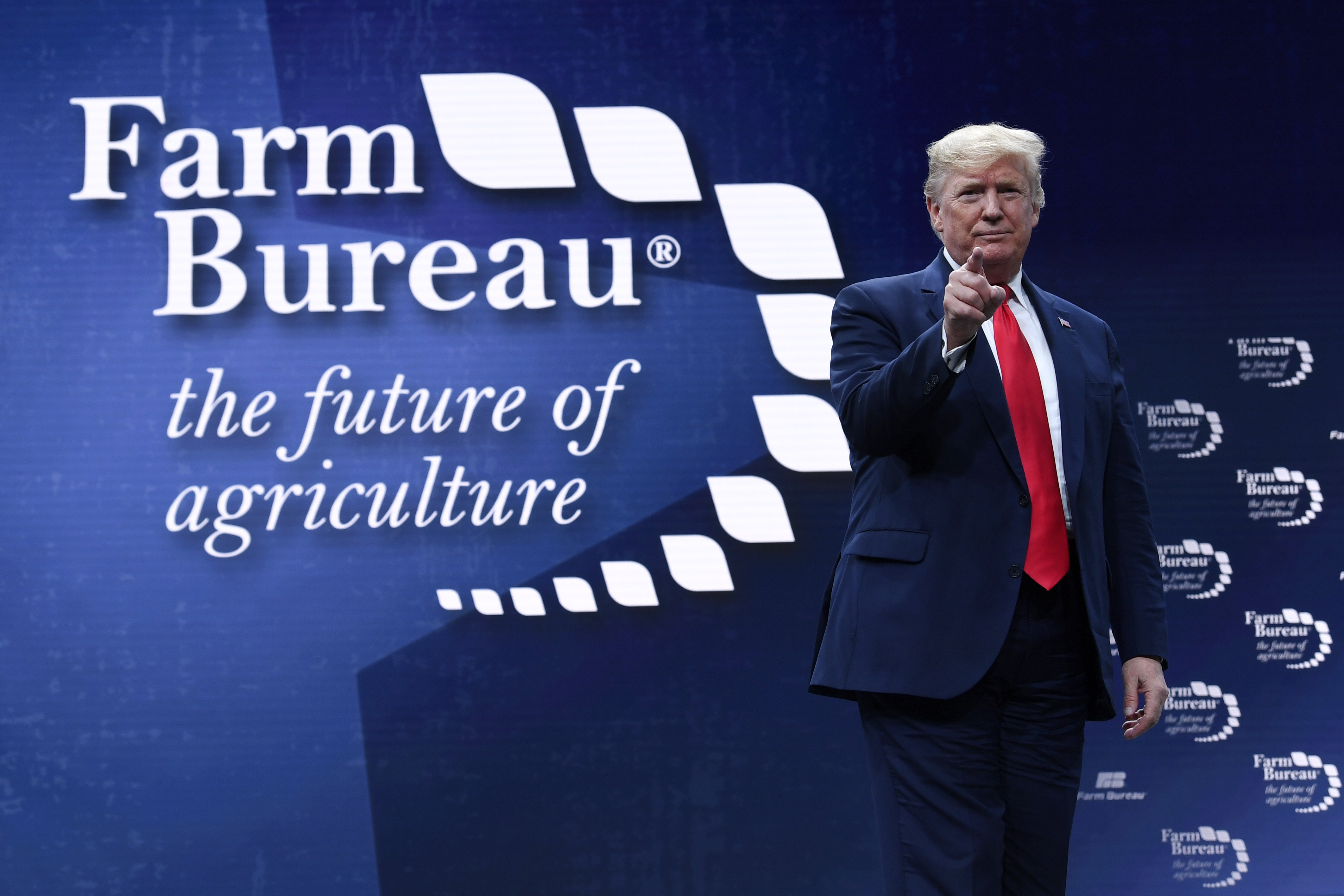 (Susan Walsh | AP) President Donald Trump walks on stage to speak at the American Farm Bureau Federation's convention in Austin, Texas, Sunday, Jan. 19, 2020.