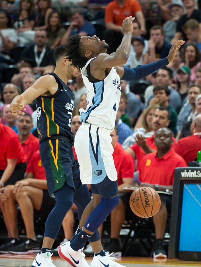 (Rick Egan  |  The Salt Lake Tribune)      Memphis Grizzlies guard Kobi Simmons (2) reacts as he is fouled by Utah Jazz guard Naz Mitrou-Long (30), in Utah Jazz summer league action between Utah Jazz and Memphis Grizzlies in Salt Lake City, Tuesday, July 3, 2018.