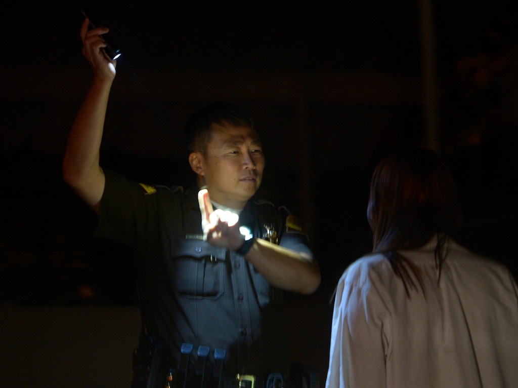 (Leah Hogsten | Tribune file photo) Utah Highway Patrol Trooper Terry Buck gives an impaired driver a sobriety test October 31, 2014. The driver was given a intoxilyzer test to determine her blood alcohol content that showed she was twice the legal limit at .166. About 160 additional UHP troopers participated in the Halloween DUI blitz to remove impaired drivers from Utah roads.