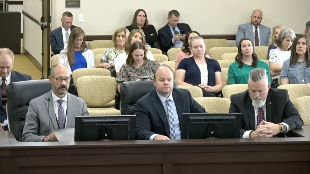(Screengrab) Kraig Brinkerhoff, center, the Alpine School District's executive director of legal services, spoke to lawmakers on the Administrative Rules Review and General Oversight Committee on Thursday, May 18, 2023. At left is David Stephenson, executive director of external relations and communications and at right is Robert Smith, business administrator.