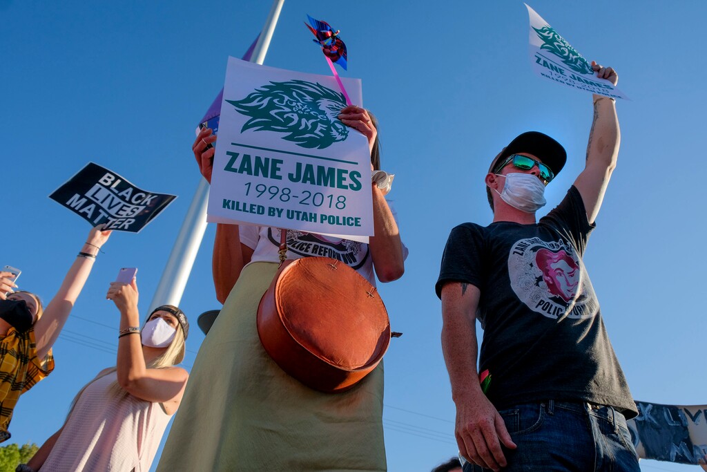 (Leah Hogsten | Tribune file photo) Gabriel Pecoraro, right, brother to Zane James was pepper-sprayed, tased and arrested, along with his father Aaron James on Sunday. Five days after after nine protesters were arrested during a peaceful rally in memory of Zane James that turned into a violent clash with Cottonwood Heights officers, demonstrators gathered outside the police station Friday to denounce CHPDÕs actions and its officers for inciting the violence.