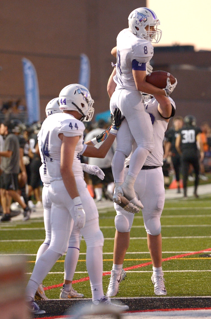 (Leah Hogsten  |  The Salt Lake Tribune) Lehi's Carsen Manookin with a touchdown. Lehi High School and Alta High School are tied, 42-42 in the second half during their game, Friday, August 18, 2017 in Sandy. 