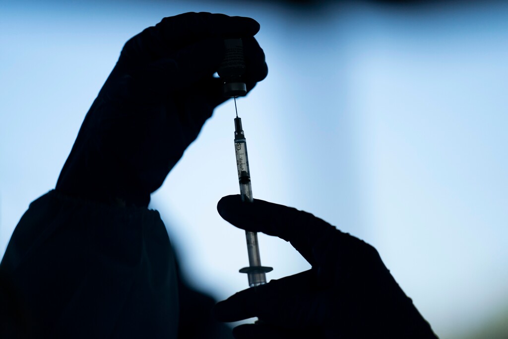 (Jae C. Hong | AP photo)

In this Jan. 21, 2021, photo, a medical staff member prepares the Pfizer-BioNTech COVID-19 vaccine at Tudor Ranch in Mecca, Calif. Democratic lawmakers are urging federal health officials to address racial disparity in vaccine access nationwide, as data from some states show hard-hit nonwhite Americans who are eligible to receive it are not getting COVID-19 vaccinations in proportion to their share of the population.