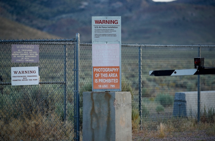 (John Locher | AP Photo) In this July 22, 2019 photo, signs warn about trespassing at an entrance to the Nevada Test and Training Range near Area 51 outside of Rachel, Nev. The U.S. Air Force has warned people against participating in an internet joke suggesting a large crowd of people "storm Area 51," the top-secret Cold War test site in the Nevada desert.