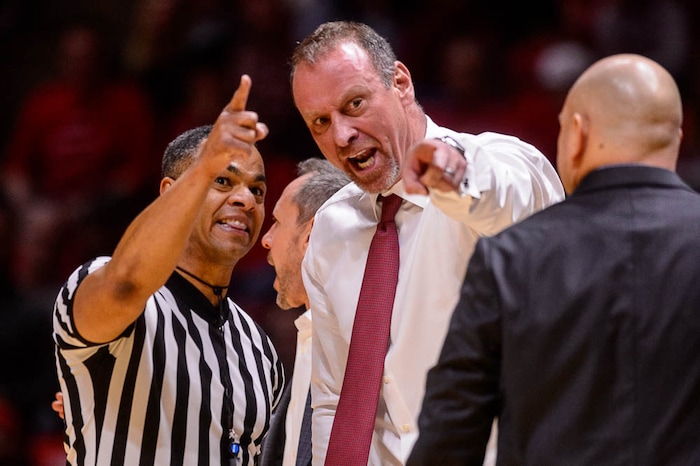 (Trent Nelson | The Salt Lake Tribune)  Utah coach Larry Krystkowiak argues with an official as the University of Utah hosts USC, NCAA basketball at the Huntsman Center in Salt Lake City, Saturday Feb. 24, 2018.